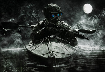 Two special forces operators with night vision goggles paddling in the army kayak in the jungle....