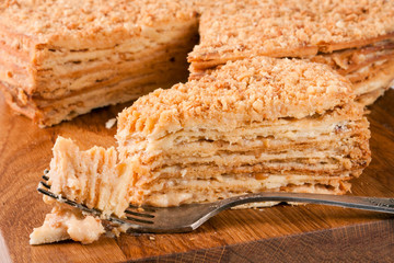 Piece of Cake Napoleon close up on a wooden board
