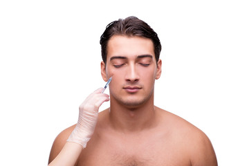 Man undergoing plastic surgery isolated on white