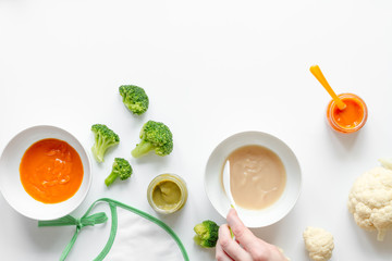 cooking vegetable puree for baby on white background top view