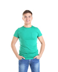 Handsome young man in blank green t-shirt on white background