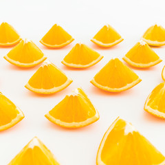 Fototapeta na wymiar Orange sliced isolated on background. Flat lay, Top view.