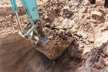 Working Excavator Tractor Digging A Trench.