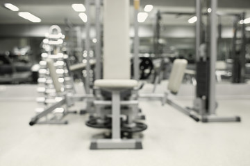 Gym interior with equipment, blurred background