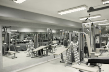Gym interior with equipment, blurred