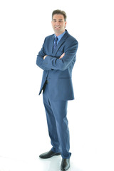 Business man standing with a smile (full aspect)