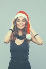 Portrait of beautiful female model wear santa hat