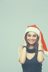 Portrait of beautiful female model wear santa hat