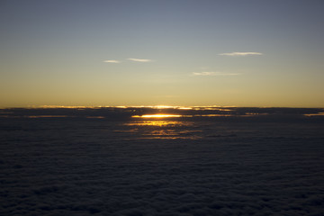 Naklejka premium Morning Sun on the clouds