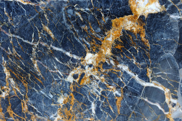 Dark gray marble have white and yellow pattern