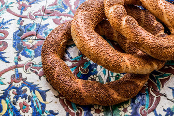 Turkish Bagel Simit on ottoman pattern surface.