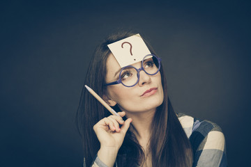 woman thinking question mark on her head