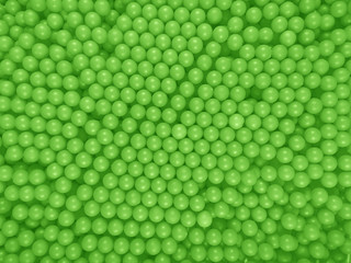 Dragee balls background - green