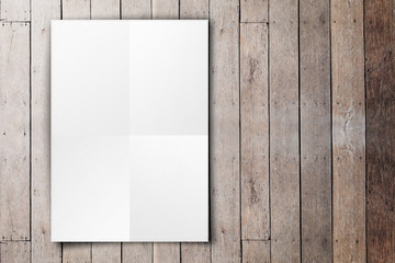 Empty white poster hanging on grunge wood plank wall,Mock up tem