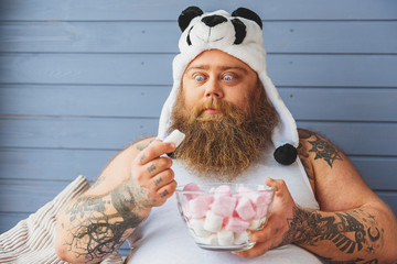 Man eating sweets