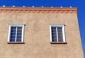 Traditional Pueblo style Adobe Architecture usually in earth tones, referred to as Old Santa Fe Style, characteristic of buildings in New Mexico, USA