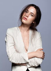 Obraz premium Portrait of beauty young brunette woman portrait in white fashio