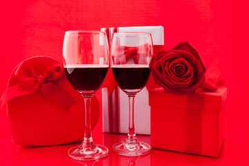 St Valentine's setting with present and red wine