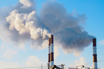 thick smoke belching from factory chimneys