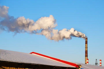 thick smoke belching from factory chimneys