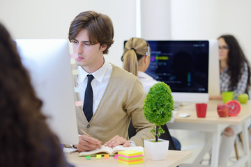 startup business, software developer working on computer at modern office