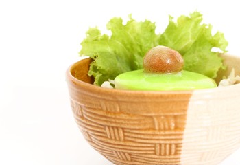 fresh vegetable salad with dressing isolated on white background