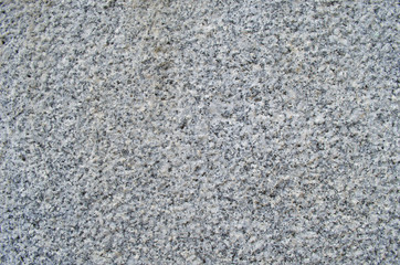 Ribbed gray wall.