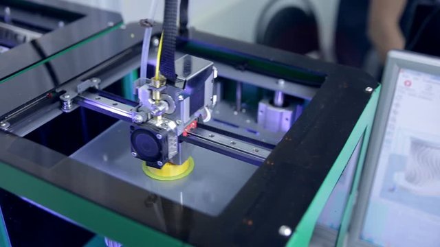 3D printers working, printing industrial element. HD