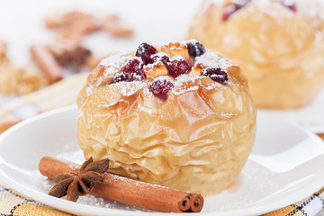 Apple baked with honey and cranberries