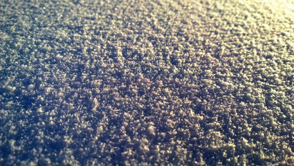 Large beautiful white-blue-yellow snow on a cold winter day