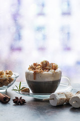 Glass of coffee with popcorn