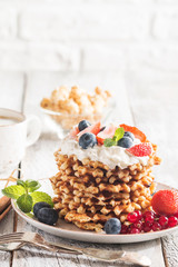 Belgian waffles with creem and berries