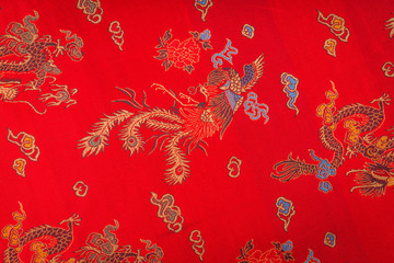 Closeup of a red silky chinese fabric  ( Filtered image processe
