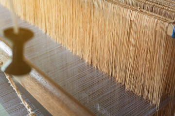 wood loom, concept of fabric textile production or hobby