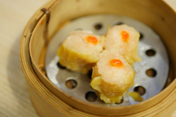 dim sum shrimp dumpling in bamboo container