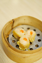 dim sum shrimp dumpling in bamboo container