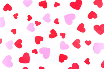 Valentine pink and red heart shapes isolated on a white background