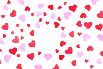 Valentine pink and red heart shapes isolated on a white background