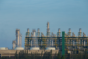Fototapeta na wymiar Oil refinery industrial plant with sky