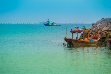 sea and Thai fishing boat with blue sky