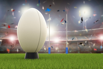 rugby ball with rugby posts on field