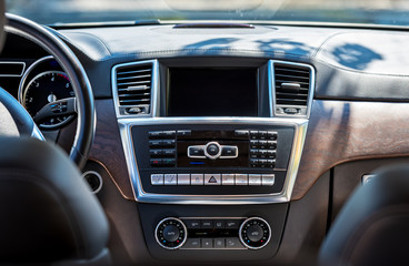 Obraz na płótnie Canvas Car interior luxury. Beige comfortable seats, steering wheel, da