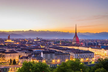 Fototapeta na wymiar Cityscape of Torino (Turin, Italy) at dusk with colorful sky