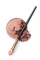 Golden eyeshadow with an applicator