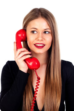 Stylish woman with a red phone