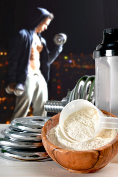 Protein shake Vanilla flavor accompanied by weights