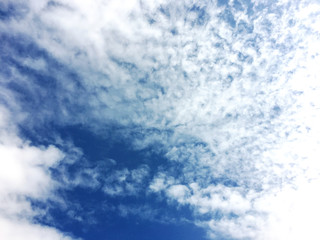 Fantastic soft white clouds against blue sky background