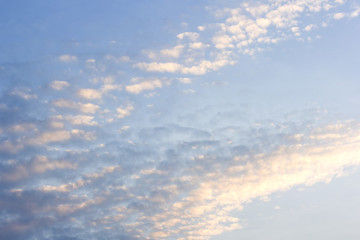 Naklejka na ściany i meble Abstract background of white clouds and blue sky.