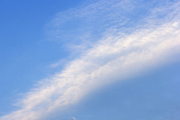 Abstract background of white clouds and blue sky.