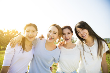 Group of young beautiful women smiling